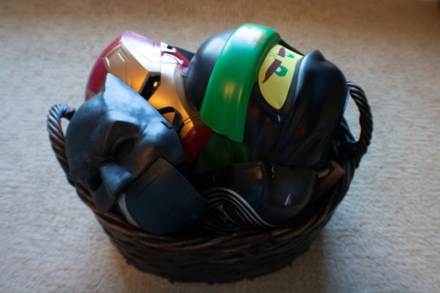 Kid's costume masks in basket