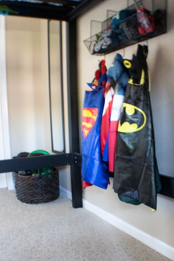 Kid's costume wall storage and basket side view