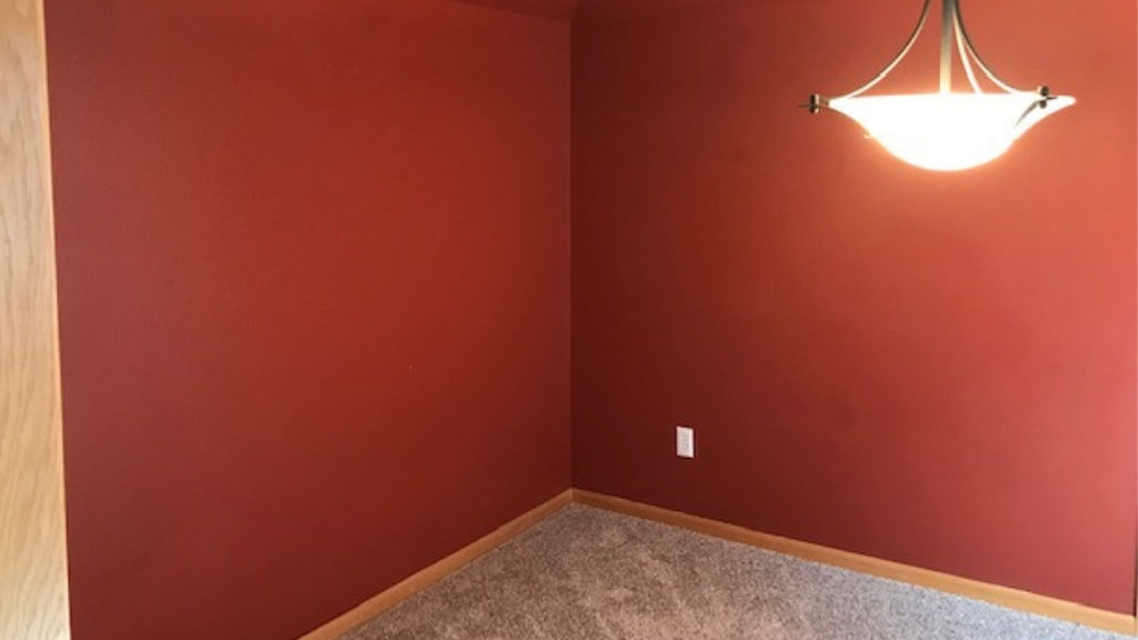 Before picture of orange wall